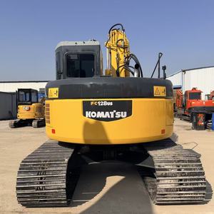 Excavatrice sur chenilles Komatsu PC128US-2 d'occasion, modèle 2022, engin de terrassement avec moteur, boîte de vitesses, pompe et roulement, à vendre - Product Image 2