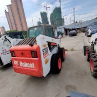 Kubota Bekas untuk Mini Skid Steer Backhoe Loader 4x4 Pompa Hidrolik Kawasaki 50KW Daya 748kg dengan Bucket Penggali