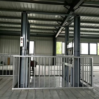Monte-charge hydraulique vertical fixe pour charges lourdes, idéal pour l'entrepôt et le levage de marchandises