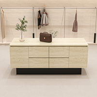 Vitrine de présentation pour magasin de vêtements féminins, chaussures et sacs, comptoir cascade en pierre, présentoir central pour bijoux et vêtements