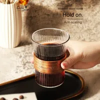 Tasse à latte en verre transparent haut de gamme tasse à café de style américain avec mousse de lait conception de fleurs modernes article ménager populaire Ins