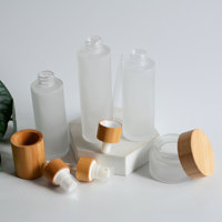 Ensemble d'emballages cosmétiques en verre dépoli, flacon pulvérisateur, flacon à bille, flacon compte-gouttes, couvercles en bambou, emballage de beauté, ensemble d'emballage pour soins de la peau