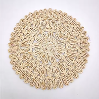 Nouveaux arrivages de tapis de table tissés naturels en cosse tissés tendance en gros personnalisés