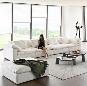Canapé modulaire avec chaise longue confortable en tissu blanc pour appartement ou villa - Product Image 1