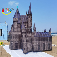 Modèle de bâtiments gonflables géants de structure de château gothique noir sauter l'église catholique