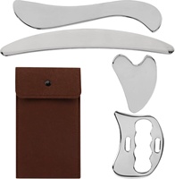 Kit de 4 outils de massage Gua Sha en acier inoxydable multi-formes pour le visage et le corps, avec pochette de rangement en feutre