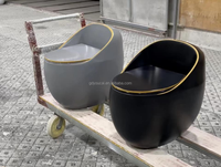 Chine articles sanitaires siège de toilette rond cuvette de toilette ronde conception commode inodoros double chasse nouveau design toilette en forme d'oeuf noir