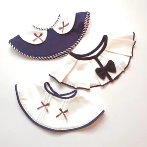 Factory price cute bow decoration girls cotton infant drool bib baby bibs