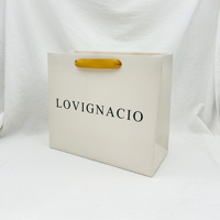 Bolsa de papel de compras reutilizable con impresión de logotipo personalizado de marca de lujo reciclable con asa de cinta