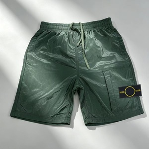 Shorts en nylon imperméables pour hommes, taille à cordon de serrage, style streetwear hip-hop, bas décontractés, couleur unie, logo sur le devant - Product Image 3
