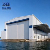Hangar de révision pour hydravions à structure métallique préfabriquée, bâtiment métallique pour quai de dérive côtier marin bleu