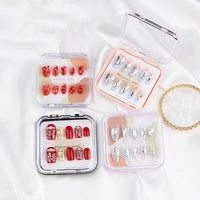 Vente en gros boîte d'emballage vide pour faux ongles boîte d'embout d'ongle en acrylique transparent forme carrée de stockage noir