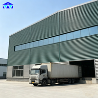 Bâtiment d'entrepôt préfabriqué à grande portée en acier Q355B avec de grands fenêtres