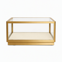 Vitrine à bijoux moderne avec éclairage LED, finition dorée, tiroirs de rangement pour les boutiques de diamants des centres commerciaux - Couleurs et dimensions personnalisables