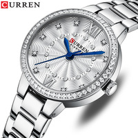 Montre pour femme en or rose, lunette en cristal, chiffres romains, cadran guilloché, bracelet à trois maillons, élégante