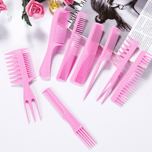 Một bộ 8 công cụ làm tóc bao gồm lược và bàn chải có tay cầm bằng nhựa để tạo kiểu và cắt tóc. - Product Image 3