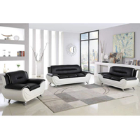Canapé d'angle modulable Laystone en cuir noir et blanc, design moderne deux places avec pieds en métal, idéal pour appartement, atelier, salon