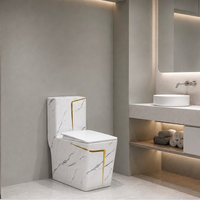 Toilette monobloc en marbre à motifs, WC carré en céramique avec élégant design veiné or pour salle de bain