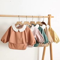 Bavoirs personnalisés en PU souple et imperméable, réutilisables, à manches longues, anti-salissures, type combinaison, pour l'alimentation des tout-petits filles