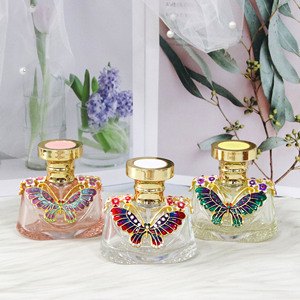 Botella de Perfume con Pulverizador de Mariposa, Diseño Floral con Incrustaciones de Colores, Botella de Vidrio y Metal para Aceites Esenciales para Mujer - Product Image 1