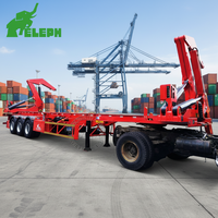Camion à conteneurs Howo Sinotruck 20 pieds 8x4, camion à conteneurs à levage latéral, camion à conteneurs à chargement latéral