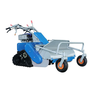 Tondeuse à fléaux sur chenilles bleue avec moteur et roues arrière pour l'entretien des pelouses - Product Image 1