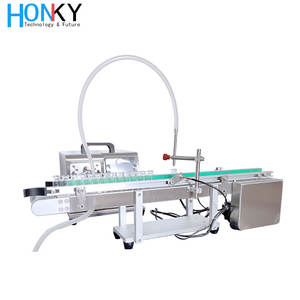 Máquina de llenado de líquidos de escritorio para pequeñas empresas Foshan, bomba de cerámica, línea de llenado de escritorio de medición automática para aceite médico - Product Image 3