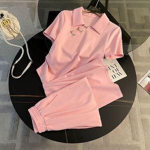 <span class=keywords><strong>Ensemble</strong></span> de sport d'été pour <span class=keywords><strong>femme</strong></span>, couleur unie, nouveau style <span class=keywords><strong>chic</strong></span> occidental, haut à manches courtes, boutons grenouille, taille cintrée, pantalon large, une pièce - Product Image 4