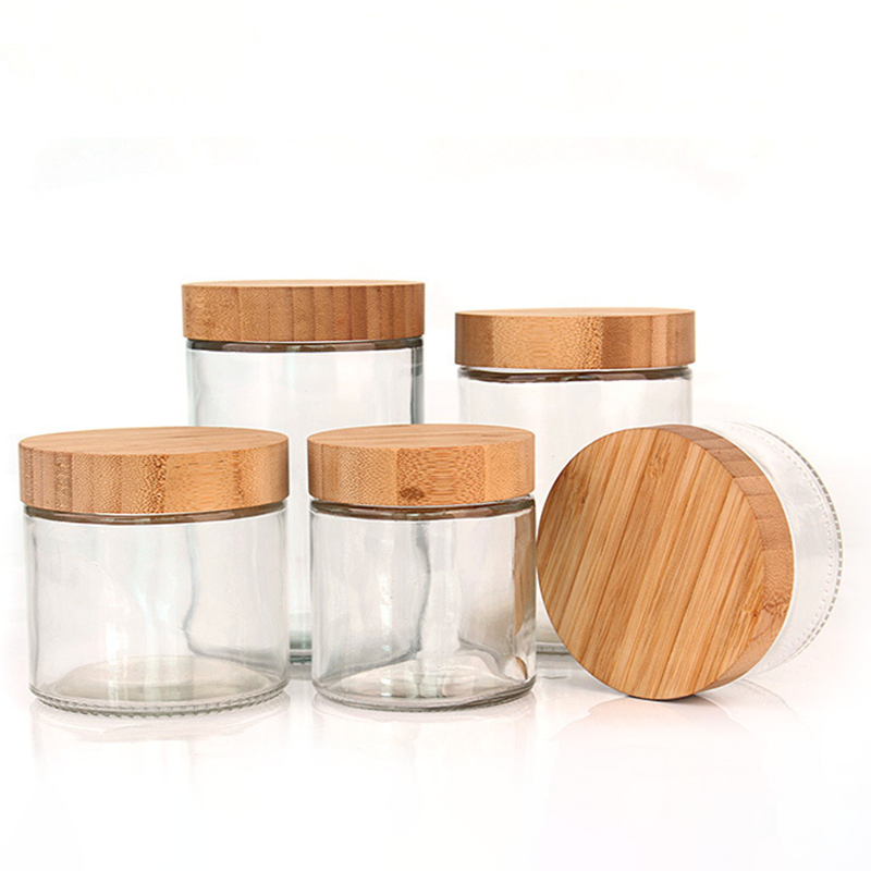 Bamboo and wood covered flower tea vase clear empty refillable glass bottle with natural bamboo lid