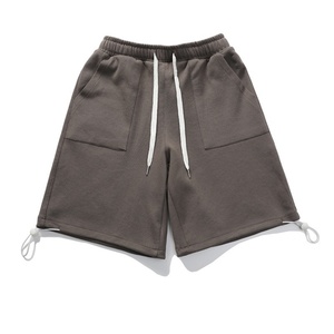 Shorts de plage pour hommes, taille mi-haute, en tissu éponge tricoté, style sportif décontracté, motif uni, avec logo personnalisé, service OEM disponible - Product Image 1