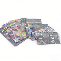 Petits sacs d'emballage refermables en mylar holographique réutilisables et recyclables avec un design transparent d'un côté