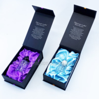 Flacons de parfum cylindriques en verre personnalisés de 30 ml et 50 ml avec des matériaux recyclés, un revêtement en éponge, des boîtes en carton et des étiquettes adhésives