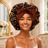 Bonnet en satin imprimé léopard avec nœud papillon et longue queue pour cheveux bouclés, tresses et cheveux naturels – Vente en gros pour femmes