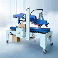 Machine d'emballage automatique pour sceller les fonds et les couvercles des boîtes, idéale pour l'emballage de boîtes de chocolat