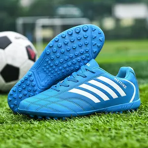 מפעל מכירה לוהטת מותאם אישית לוגו דשא חיצוני כדורגל נעלי כדורגל סוליות לגברים נשים