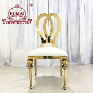 Chaise empilable en acier inoxydable doré pour mariage, banquet et salle à manger, dossier croisé en X - Product Image 1