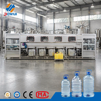 Machine de remplissage d'eau en fûts PET de 5 gallons, 900 BPH, ligne de traitement de fûts stable pour eau de source moyenne, idéale pour les petites entreprises.