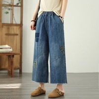 Nouveau Pantalon Large en Jean Bleu Brodé Floral Style Neo-Chinois Taille Haute Ample Coupe Courte pour Femme – Collection Printemps 2026 (Vente en Gros)