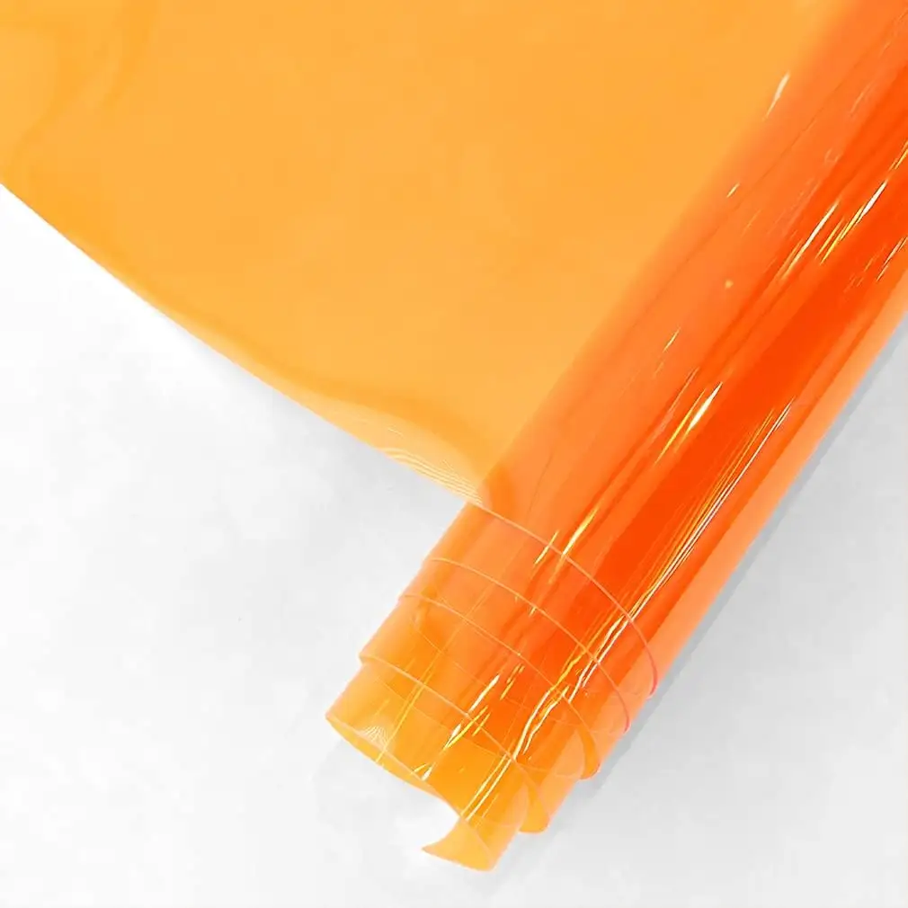 Film de PVC laminé à froid adhésif de couleur lumineuse orange holographique pour la fabrication de papier peint