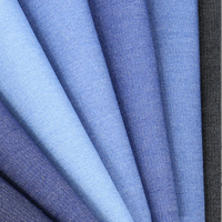 Tissu en denim tissé bio écologique 75% coton 12% rayonne 13% polyester sergé teint uni poids moyen pour garçons, femmes, hommes, filles