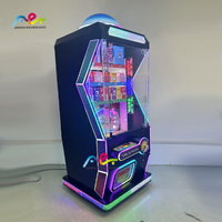 Machine de jeu d'arcade à monnayeur avec griffes et prix rotatifs
