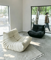 Canapé-lit modulaire sans accoudoirs en fauteuil lounge moderne, coloris blanc crème, avec revêtement en polaire sherpa, pour salon et appartement
