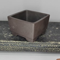 Pot à bonsaï miniature en argile violette fait main avec un design de pieds en forme de nuage