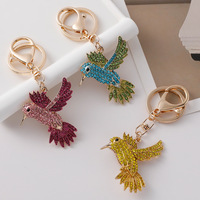 Porte-clés créatif plaqué or avec breloque oiseau, porte-monnaie, en alliage, orné de strass et de cristaux, motif animal, impression typographique