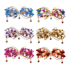 Pince à cheveux colorée en forme de nœud pour femme, luxueuse, avec strass, 9,0 cm, en alliage, pour queue de cheval - Product Image 1