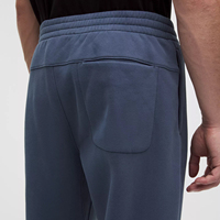 Pantalon de jogging élastique pour homme avec cordon de serrage, logo personnalisé, en molleton bouclette respirant avec poche arrière, fabrication ODM