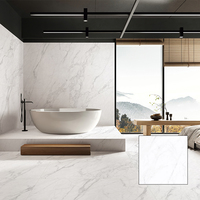Vente en gros de carreaux de sol en pierre frittée 1200x1200 en blanc et gris, aspect marbre, approvisionnement direct d'usine pour les projets hôteliers