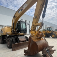Excavatrice sur pneus CAT M320D d'occasion, 20 tonnes, Caterpillar M320D, à vendre