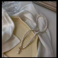 Collier classique intemporel avec fermoir en forme de cœur