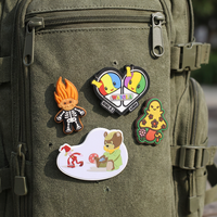 Badge en PVC personnalisé OEM, design sur mesure, écologique, avec support thermocollant, durable, sans nickel, en caoutchouc PVC, logo personnalisé